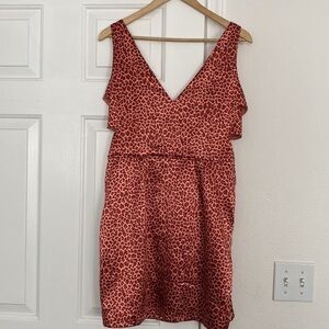 Sweet storm cheetah print mini dress with cutouts.